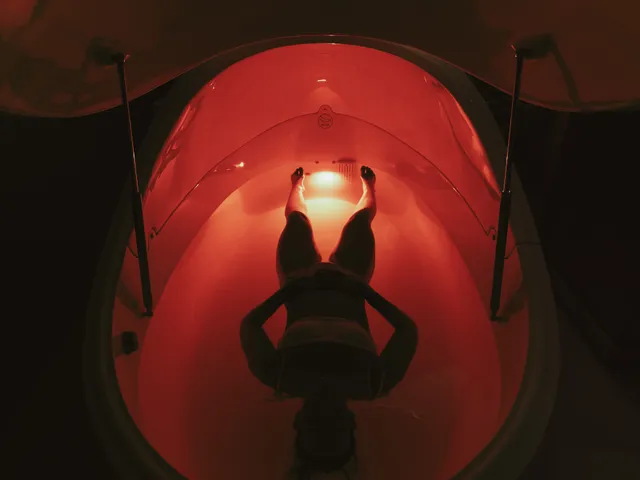 Aerial view of a float pod bathed in red light at Davaar House